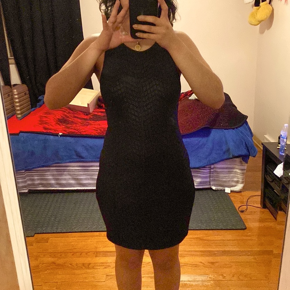 Cute black dress that shows off your curves ;)